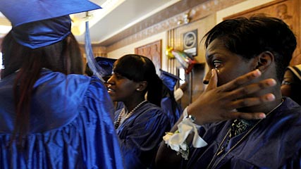 Iyanta Simon wipes away a tear during graduation Iyanta Simon wipes away a tear during graduation