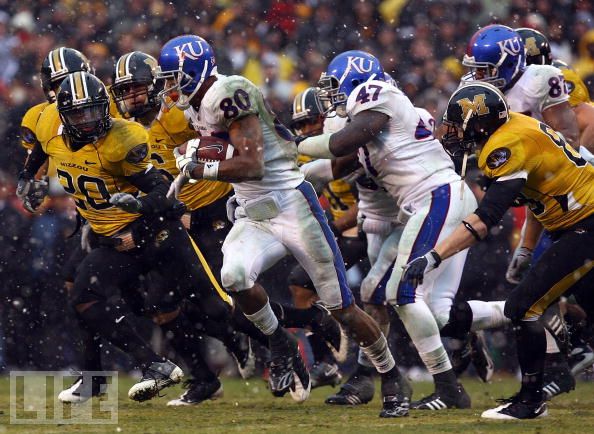 Kansas Jayhawks versus the Missouri Tigers Kansas Jayhawks versus the Missouri Tigers
