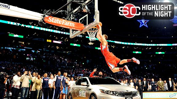 BLAKE GRIFFIN LEAPS OVER A CAR